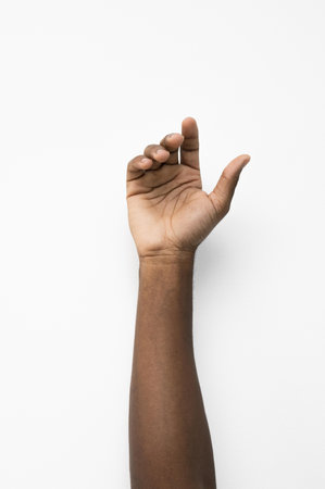 black person holding their hand up. Resolution and high quality beautiful photoの写真素材