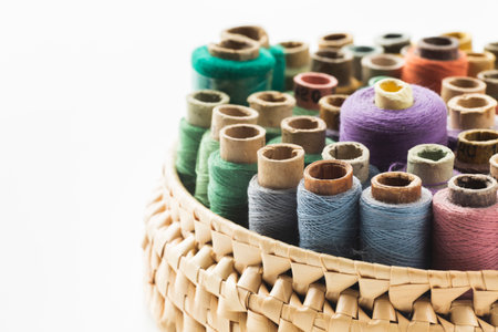 basket sewing threads white backgroundの写真素材
