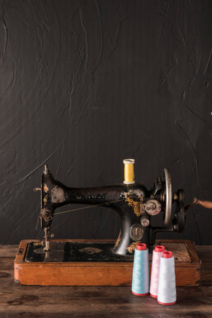 cotton threads near sewing machine