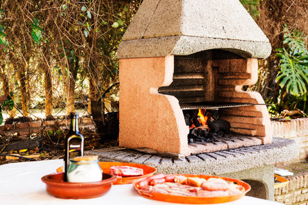 assortment meat near outdoor barbecueの写真素材