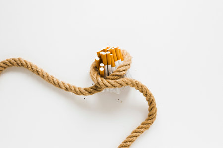 top view cigarettes tied by rope