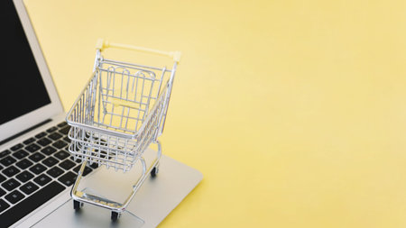 small cart on laptop. Resolution and high quality beautiful photo