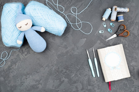 slate background with blue woolの写真素材