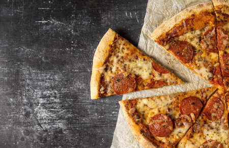 top view slices salami pizza. Resolution and high quality beautiful photoの写真素材