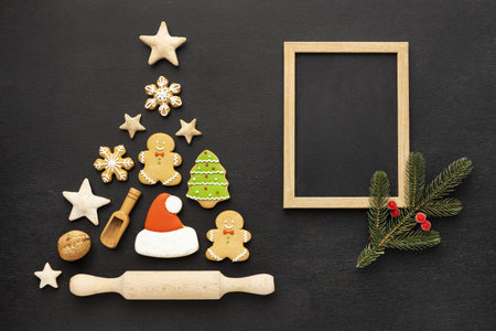 top view christmas gingerbread cookies assortment with empty frame. Resolution and high quality...