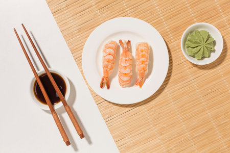 sushi day concept with wasabi chopsticksの写真素材
