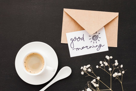 greeting card beside cup coffeeの写真素材