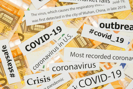 newspaper covid 19 titles moneyの写真素材