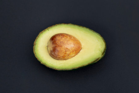 top view avocado half with pit