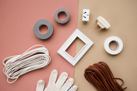wire plug button insulating tape glove dual background