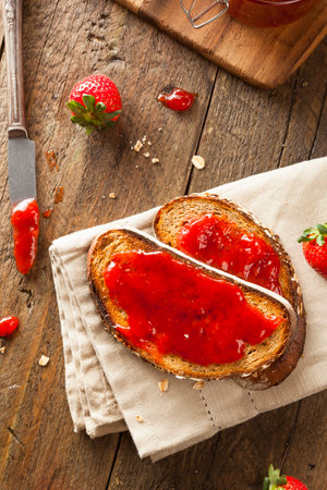 Homemade Strawberry Jelly on Whole Wheat Toastの写真素材