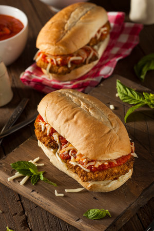 Hearty Homemade Chicken Parmesan Sandwich with Marinara and Cheeseの写真素材