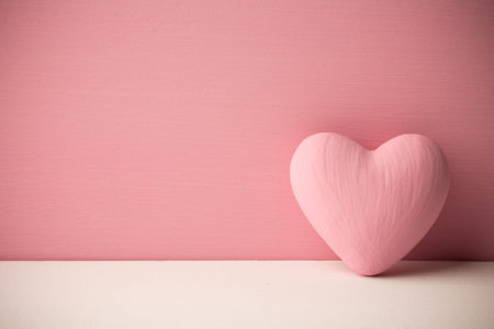 Pink heart on the wooden background. Provencal style.