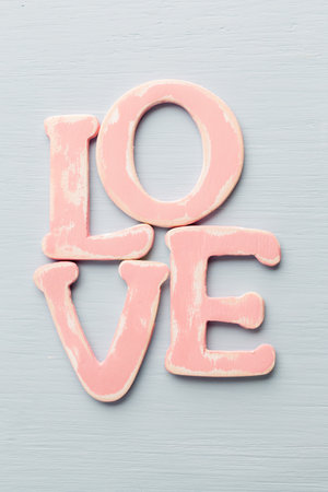 Message of love with wood pink letters.の写真素材