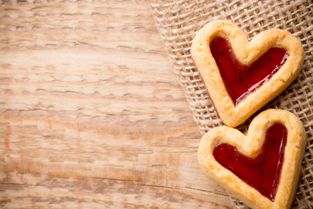Heart-shaped cookies on a wooden background. Studio picture.の写真素材