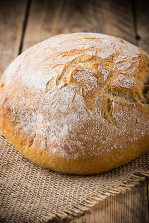 Fresh Irish bread on a wooden background. Studio photography.
