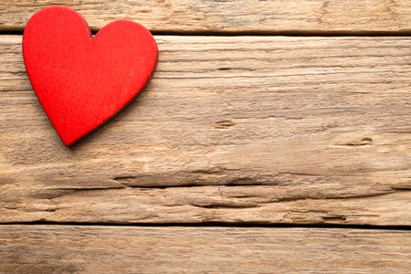 On old wooden planks heart shape.の写真素材