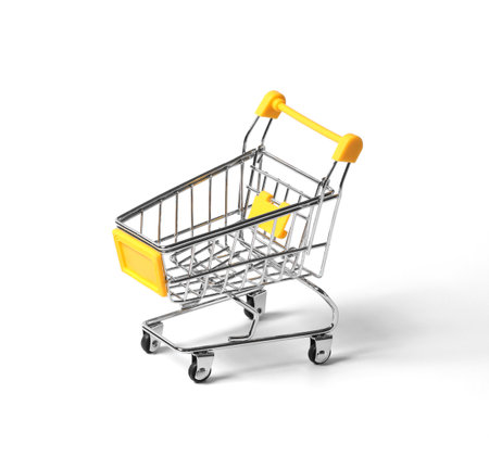 empty shopping trolley isolated on white background. close-up of shopping cart on white background with some copy spaceの写真素材