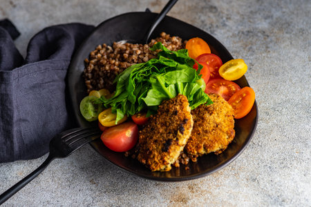 Healthy vegetable and meat cutlet cowl with raw and fresh ingredientsの写真素材