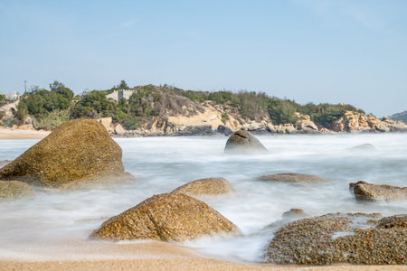 Beaches, waves and stones by the seaの写真素材