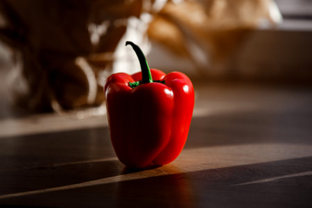 natural, organic Red pepper on wooden background. vegetarian concept. one pepperの写真素材