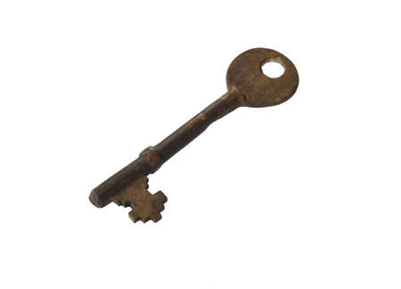Old key isolated on whiteの写真素材