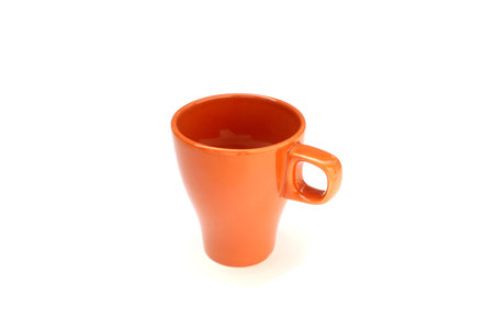 orange cup mug drink isolated on white backgroundの写真素材