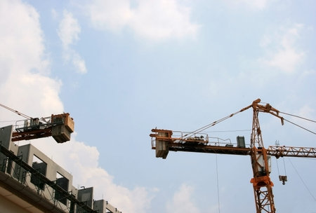 building crane against the blue sky