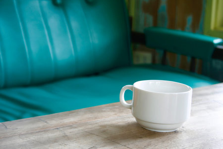 Coffee cup on table in restaurant cafe