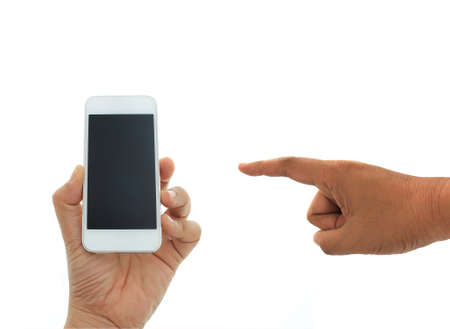 Phone in hand - to work on a smartphone with a blank screenの写真素材