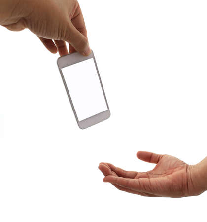 Phone in hand - to work on a smartphone with a blank screenの写真素材