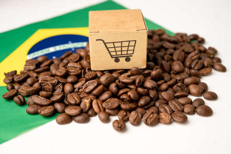 Coffee beans on Brazil flag; import export drink food concept.の写真素材