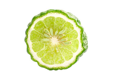 Fresh bergamot fruit with cut in half on white background.の写真素材
