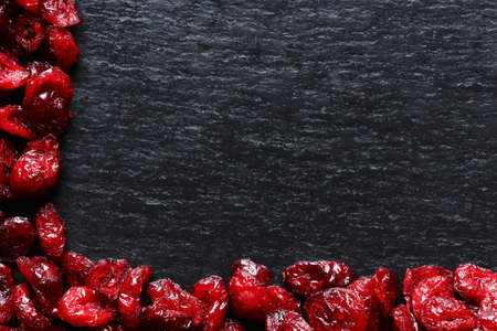 Photography of cranberries on slate background for restaurant menu, label or signの写真素材