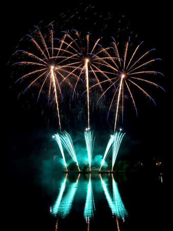 Colorful Fireworks for the Grand Finale over Lakeの写真素材