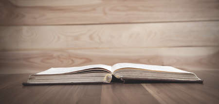 Holy Bible on the wooden table.の写真素材
