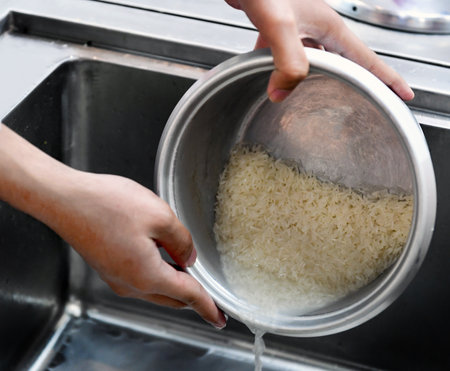Rice wash before cooking, Before the rice cooker to cookの写真素材