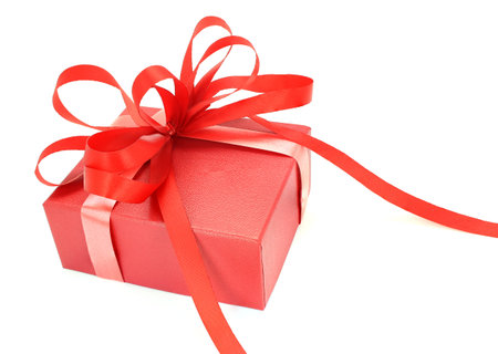 Red gift box with ribbon bow isolated on white background