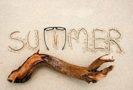 The word summer in the sandの写真素材