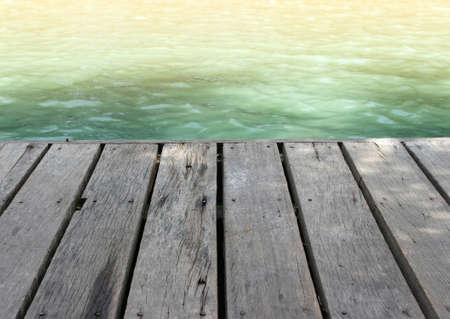 Wood plank floor on water surface backgroundの写真素材
