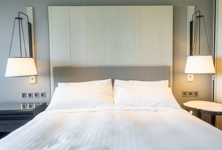 white pillows decoration on bed in bedroom