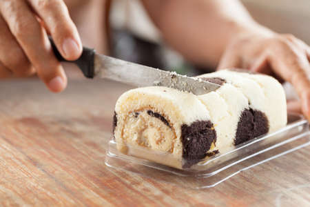 Knife were cutting the cakeの写真素材