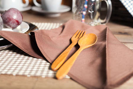Wooden spoon and fork Placed on the napkin.の写真素材