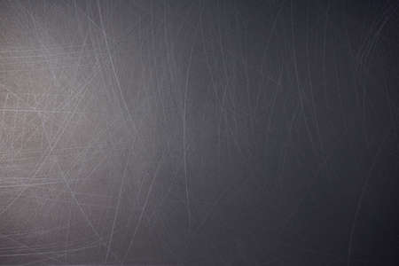 Scratchy black smooth grunge blank background. Retro texture pattern abstract. Space for your text, flat lay, mockup, or design. Gobo light style.の写真素材