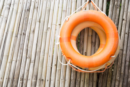 Ring hanging on a wooden wall.