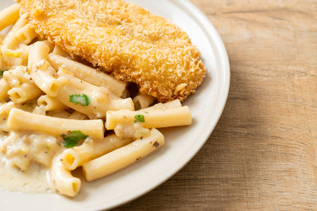 quadrotto penne pasta white cream sauce with fried fish