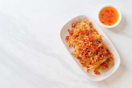 Fried Enoki Mushroom or Golden Needle Mushroom with Salt and Chilliの写真素材