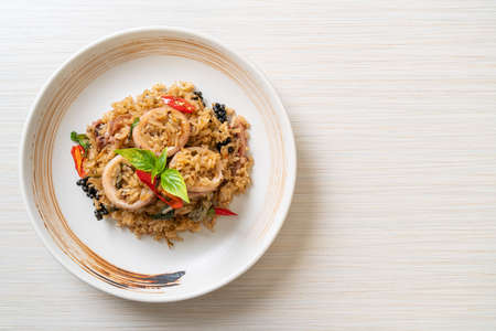 Basil and Spicy Herb Fried Rice with Squid or Octopusの写真素材