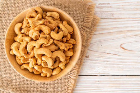 Cashew nuts in wooden bowlの写真素材