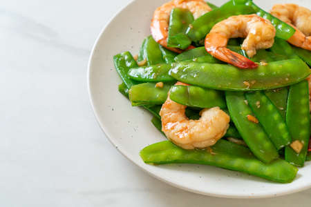 Stir-Fried Green Peas with Shrimpの写真素材